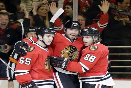 Blackhawks Break Record, Sit 14-0-3 with Win over Sharks 1 Viktor Stalberg (middle) celebrates with Patrick Kane (88) and Andrew Shaw (65) after his second-period goal (AP)