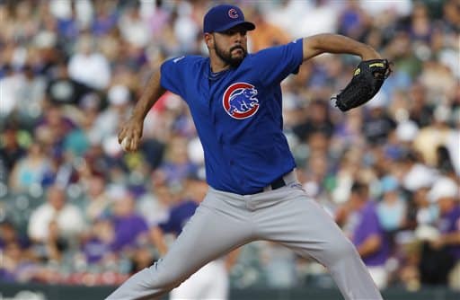 Rocky Pitching Costs Cubs as Rockies Even Series 1 Chicago Cubs starting pitcher Carlos Villanueva works against the Colorado Rockies in the first inning of a baseball game in Denver on Saturday, July 20, 2013, in Denver. (AP Photo/David Zalubowski)