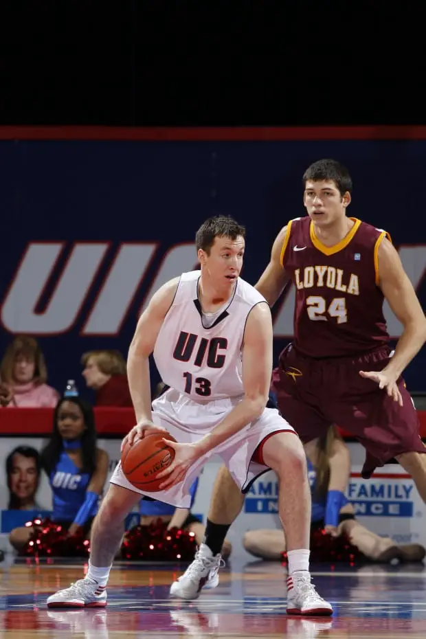 Meet UIC's new "Big Three" 1 Hayden Humes (13) posts up against Loyola's Ben Averkamp last season (photo courtesy of Google)