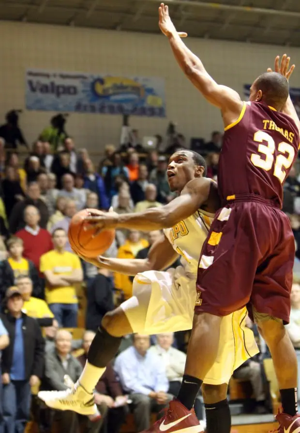Thomas has taken over as Loyola's new leader 1 Thomas (32) playing defense against Valparaiso last season (photo courtesy of NW Indiana Times)