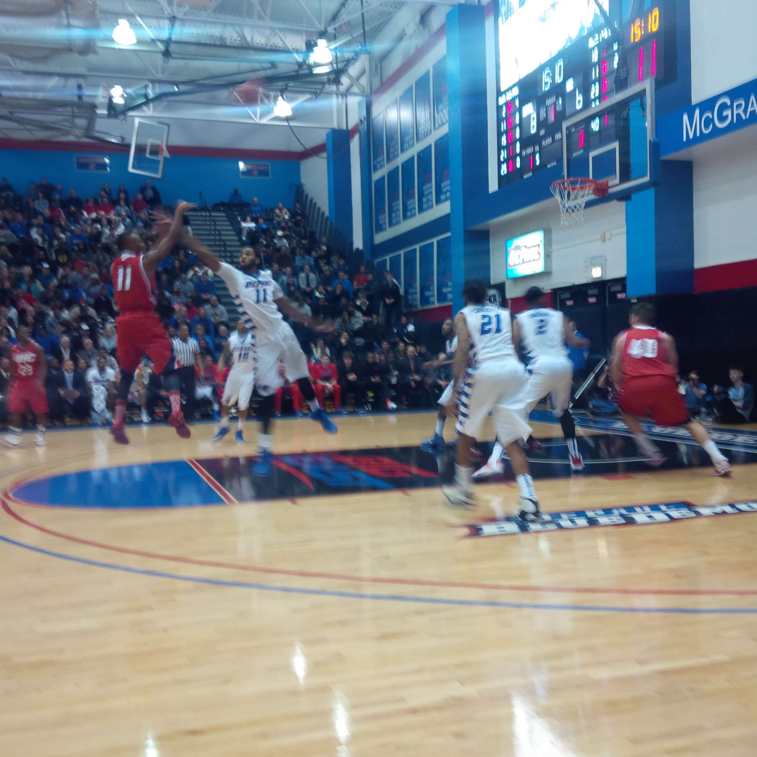 DePaul wins shootout over UIC to open the season 1 UIC guard Paris Burns (11/red jersey) puts up a shot against DePaul's defense.