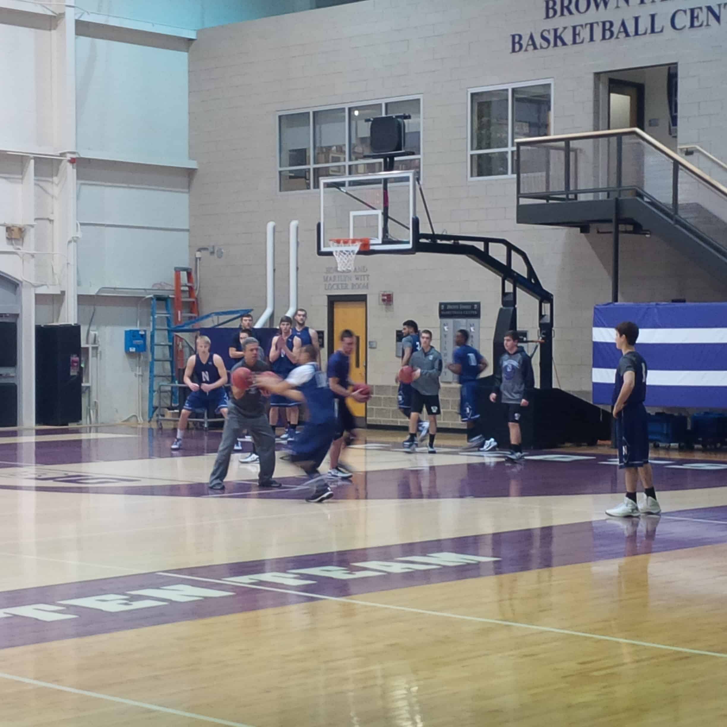The new and improved Alex Olah 1 The Northwestern Wildcats basketball team warms up before Wednesday's practice.