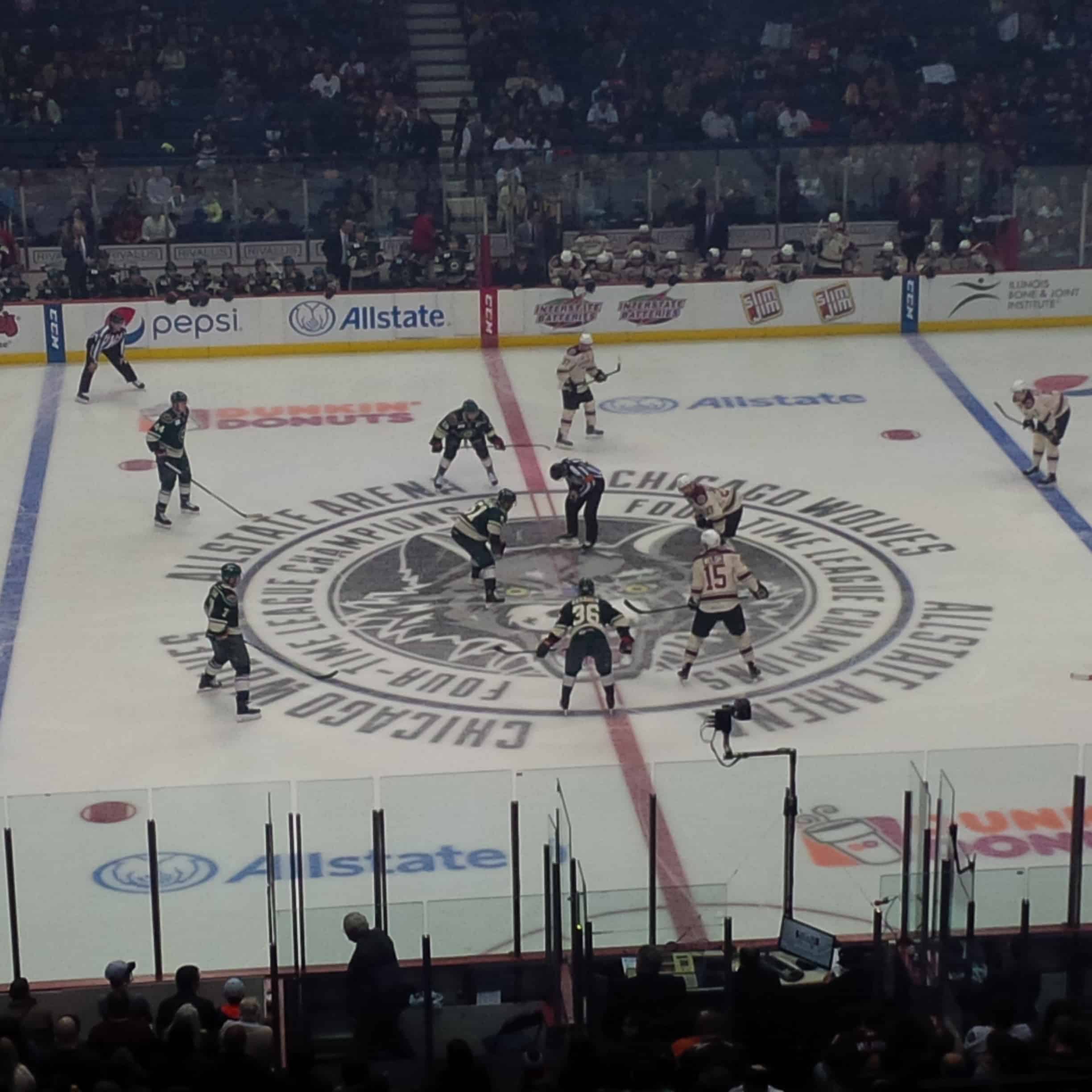 The Wolves (white jerseys) opening face-off against Iowa.