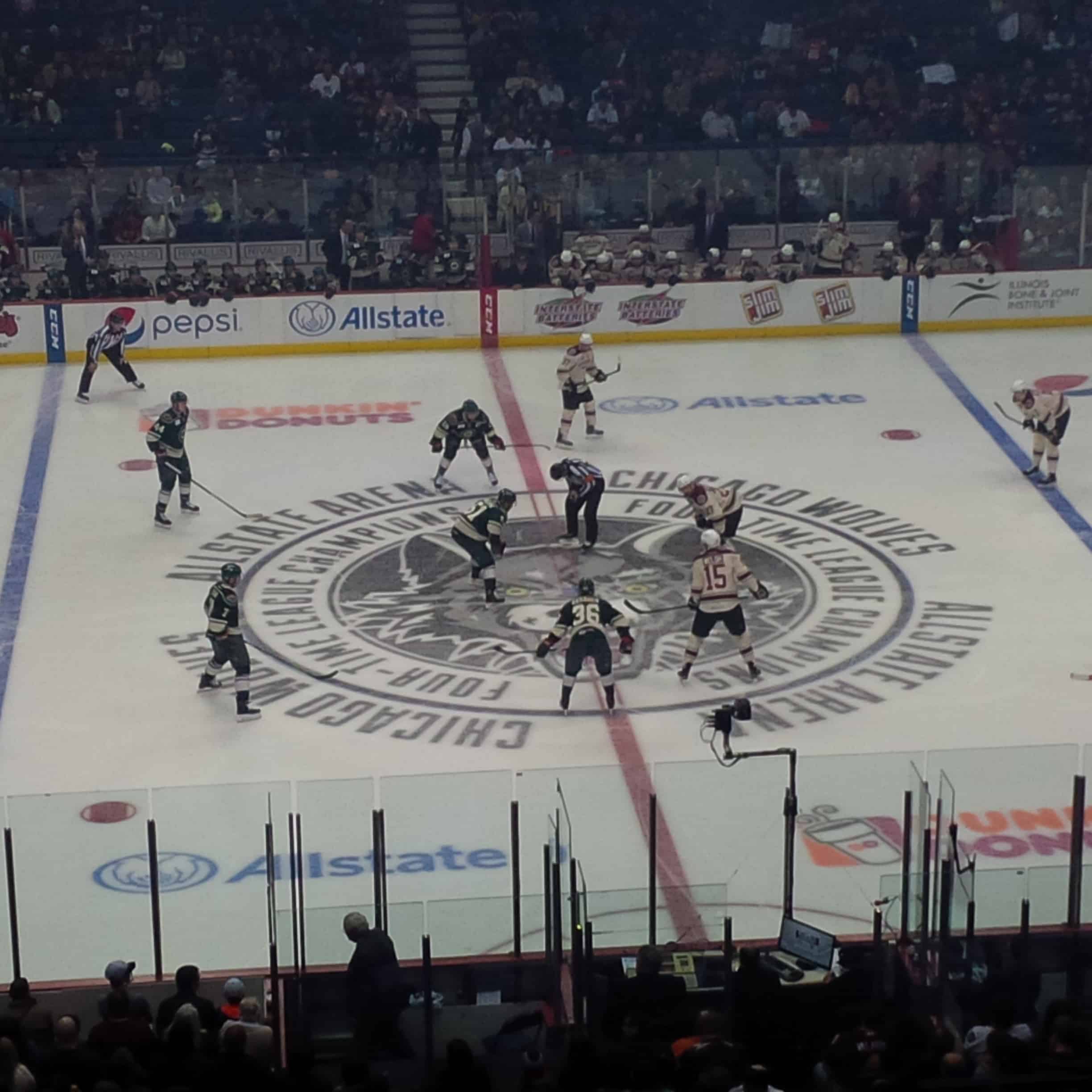 Wolves 3 Wild 2 1 The Wolves (white jerseys) opening face-off against Iowa.