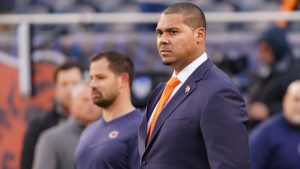 Chicago Bears GM Ryan Poles standing at the sidelines at a game