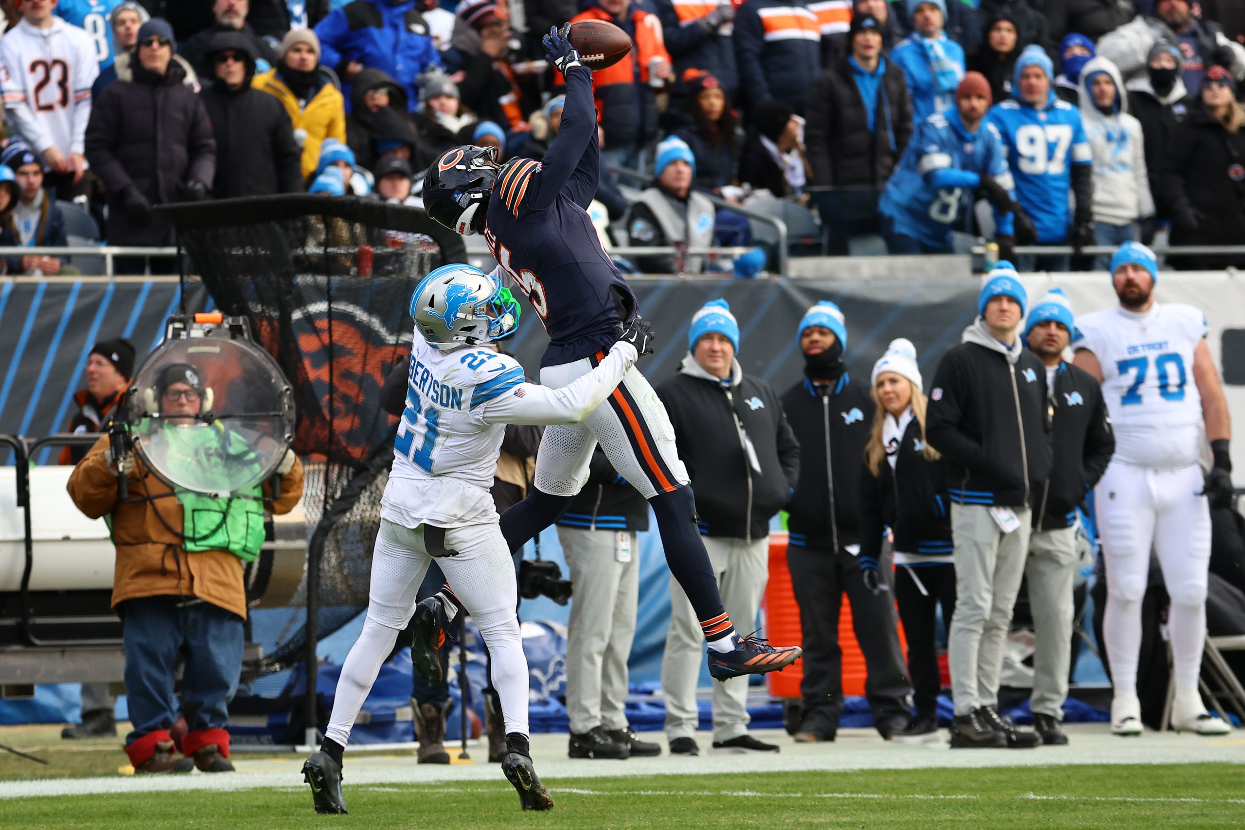 NFL: Detroit Lions at Chicago Bears Chicago Bears wide receiver Rome Odunze (15) makes a catch over Detroit Lions cornerback Amik Robertson (21) during the second half at Soldier Field.
