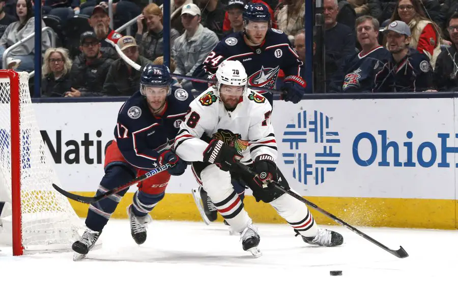 NHL: Chicago Blackhawks at Columbus Blue Jackets Chicago Blackhawks defenseman T.J. Brodie (78) reaches for the puck as Columbus Blue Jackets right wing Justin Danforth (17) trails the play during the third period at Nationwide Arena.