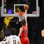 Chicago Bulls' 20-year-old wing named to All-Rookie Second Team 2 Chicago Bulls forward Matas Buzelis (14) shoots against Los Angeles Lakers center Jaxson Hayes (11) and guard Austin Reaves (15) during the first half at Crypto.com Arena.
