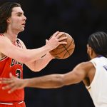 Chicago Bulls guard Josh Giddey (3) looks to pass against Los Angeles Lakers guard Gabe Vincent