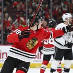 Chicago Blackhawks young forward already making an impact in his Rockford return 5 Chicago Blackhawks center Colton Dach (28) points towards Chicago Blackhawks defenseman Alec Martinez (25) after he scored agaijst the Los Angeles Kings during the first period at the United Center.