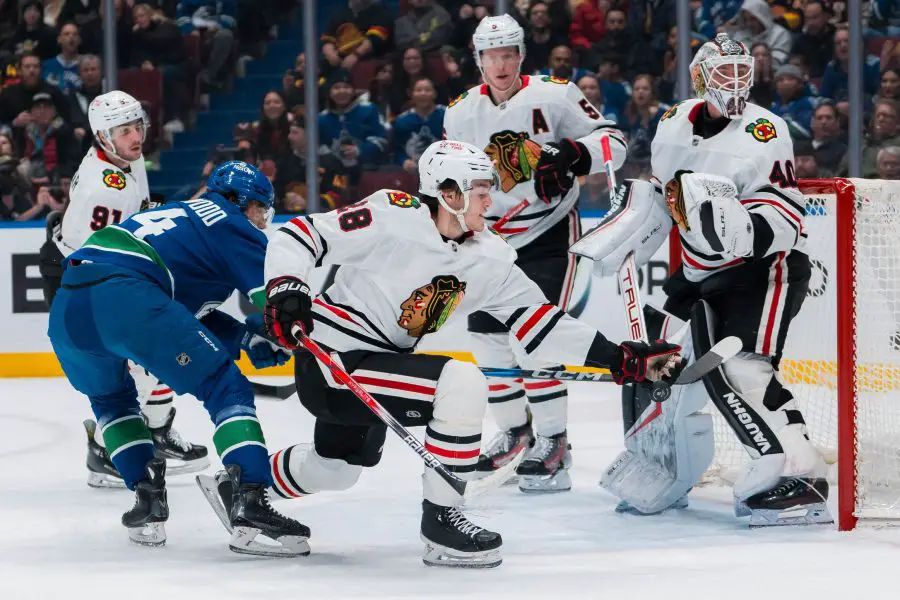 NHL: Chicago Blackhawks at Vancouver Canucks Vancouver Canucks forward Kiefer Sherwood (44) watches as Chicago Blackhawks forward Colton Dach (28) reaches for a loose puck in the first period at Rogers Arena.
