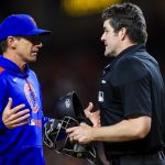 Calls mount for Chicago Cubs to DFA starting pitcher after giving up 8 earned runs 2 Chicago Cubs manager Craig Counsell (11) talks with umpire John Bacon (70) after a play in the seventh inning in the game against the Cincinnati Reds at Great American Ball Park.
