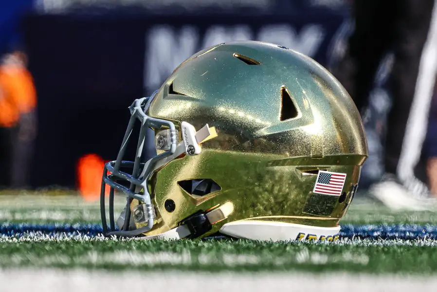 NCAA Football: Notre Dame at Navy A Notre Dame Fighting Irish helmets rests on the field before the game between the Fighting Irish and the Navy Midshipmen at MetLife Stadium.