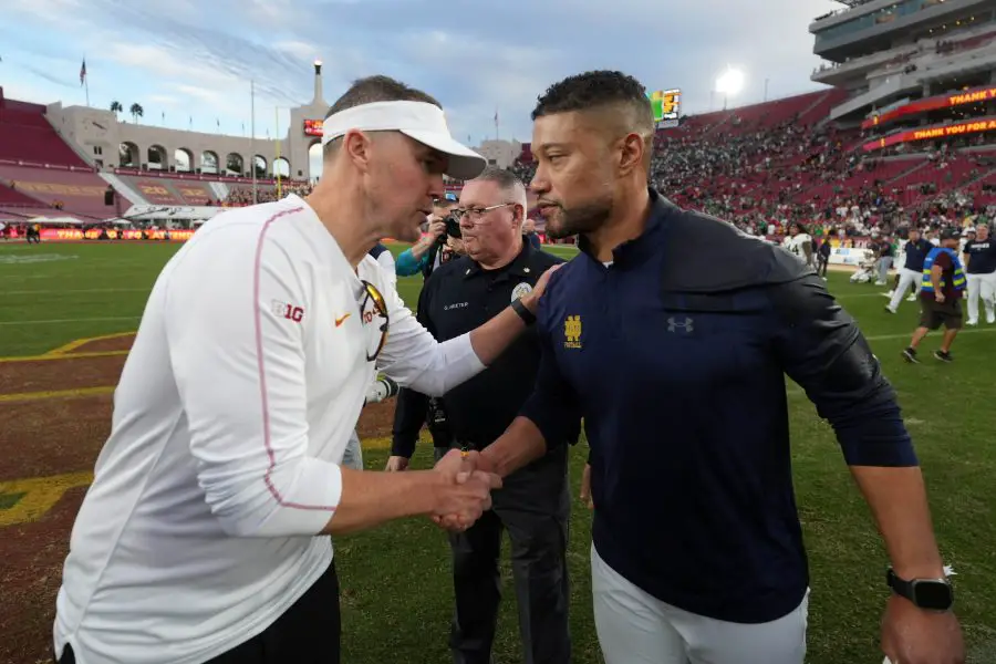 NCAA Football: Notre Dame at Southern California Southern California Trojans head coach Lincoln Riley and Notre Dame Fighting Irish head coach Marcus Freeman shake hands after the game at United Airlines Field at Los Angeles Memorial Coliseum.