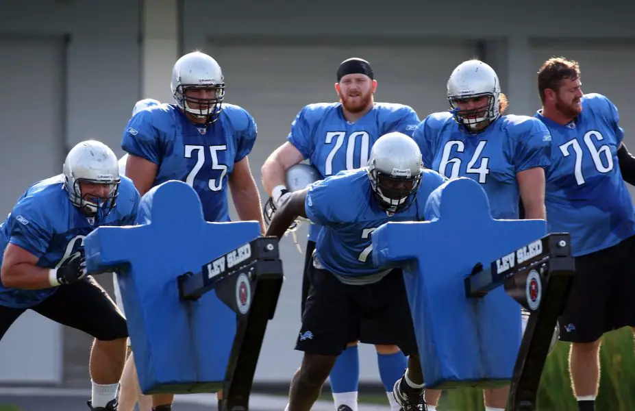 NFL: Detroit Lions Training Camp Detroit Lions offensive guard Dylan Gandy (65) and offensive tackle Gosder Cherilus (77) work out as offensive tackle Kirk Barton (75) offensive tackle Daniel Loper (70) center Dan Gerberry (64) and offensive tackle Jeff Backus (76) look on during the morning drills during training camp at the Lions practice facility. Mandatory Credit: Leon Halip-Imagn Images