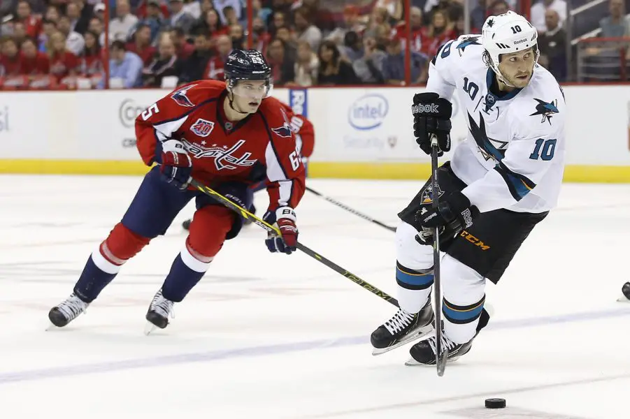 NHL: San Jose Sharks at Washington Capitals San Jose Sharks center Andrew Desjardins (10) skates with the puck past Washington Capitals left wing Andre Burakovsky (65) in the second period at Verizon Center. The Sharks won 6-5 in a shootout.