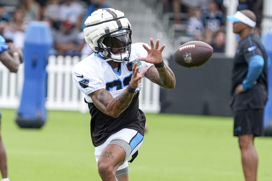 Carolina Panthers safety Alex Cook (27) makes a catch during training camp at Carolina Panthers Practice Fields. 