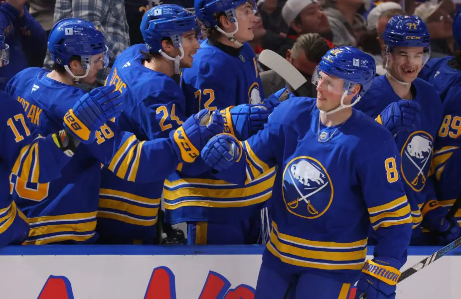 Buffalo Sabres center Sam Lafferty (81) celebrates his goal with teammates during the first period against the Seattle Kraken at KeyBank Center. 