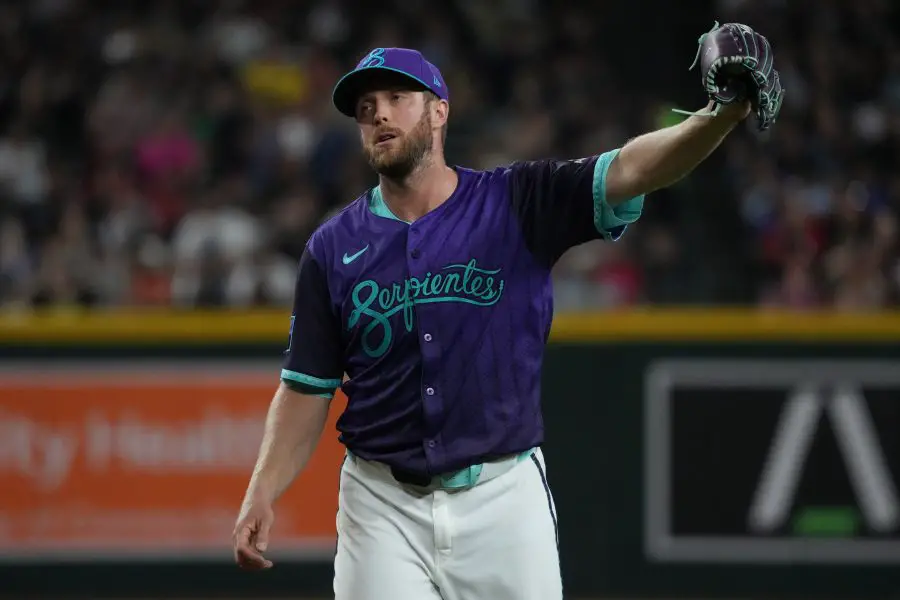 Arizona Diamondbacks pitcher Merrill Kelly (29) reacts after making a violation against the Miami Marlins in the fifth inning at Chase Field. 