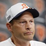 Chicago Bears head coach Ben Johnson speaks during training camp at Halas Hall.