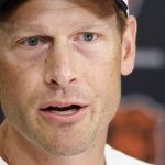 Chicago Bears head coach Ben Johnson speaks during training camp at Halas Hall.