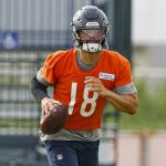 Chicago Bears quarterback Caleb Williams (18) runs with the ball during training camp at Halas Hall.