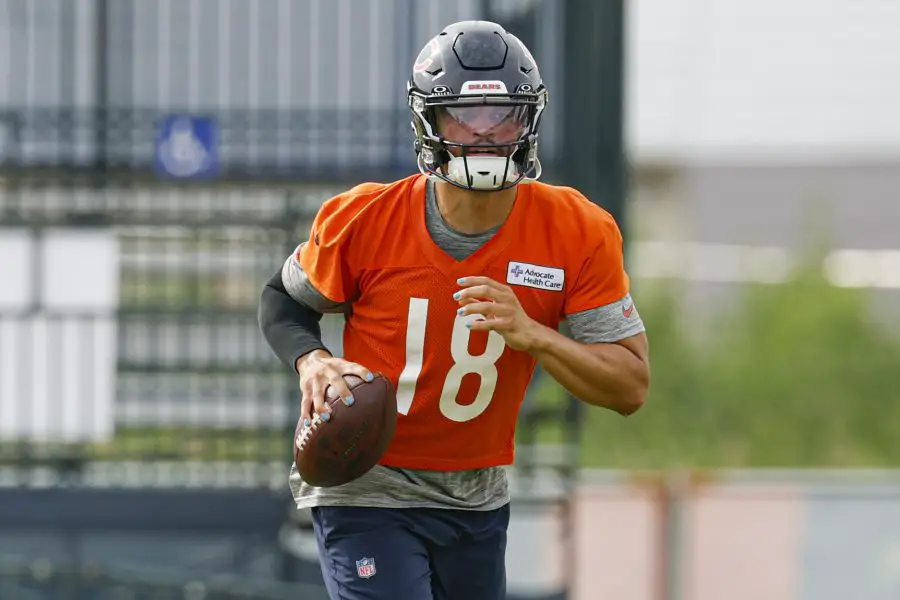 NFL: Chicago Bears Training Camp Chicago Bears quarterback Caleb Williams (18) runs with the ball during training camp at Halas Hall.