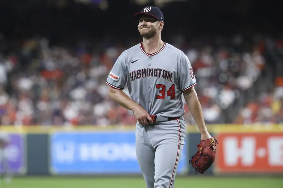 Washington Nationals starting pitcher Michael Soroka (34) walks off the field