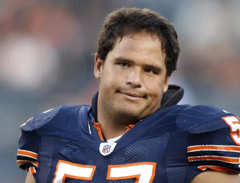  Chicago Bears center Olin Kreutz warms up before the preseason game against the Cleveland Browns at Soldier Field. 