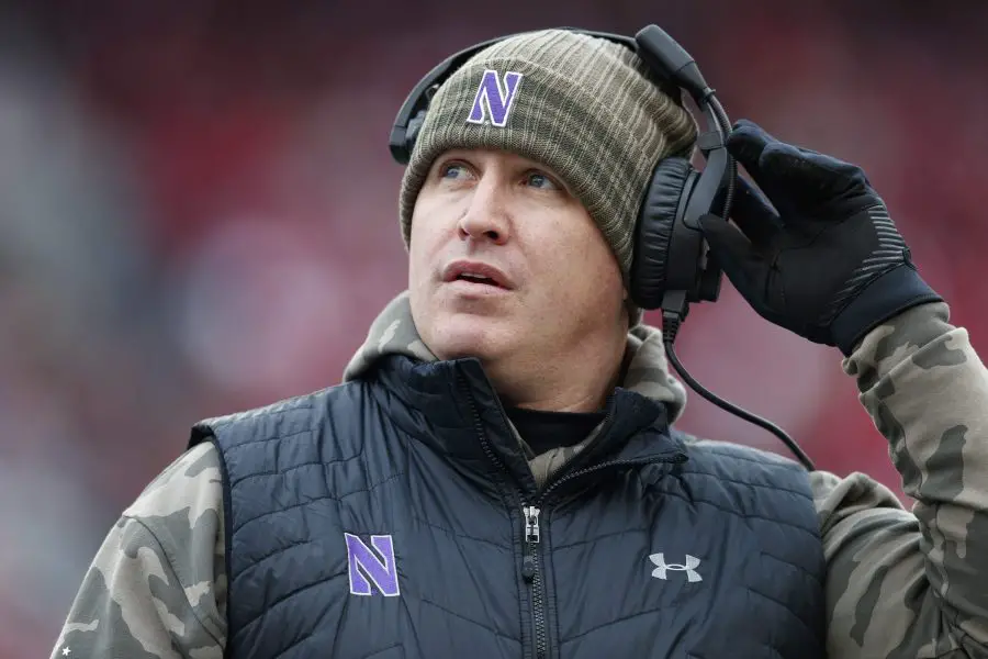 Northwestern Wildcats head coach Pat Fitzgerald looks to the scoreboard during the second quarter against the Wisconsin Badgers at Camp Randall Stadium. 