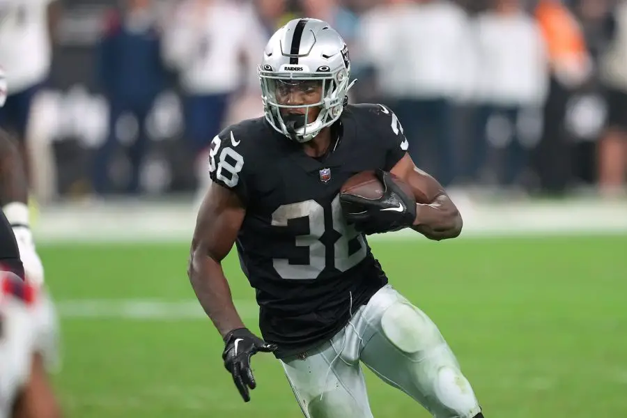 NFL: New England Patriots at Las Vegas Raiders Las Vegas Raiders running back Brittain Brown (38) carries the ball against the New England Patriots during a preseason game at Allegiant Stadium.