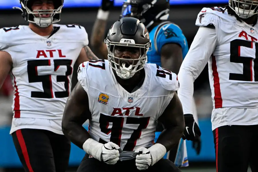 Atlanta Falcons defensive end Grady Jarrett (97) celebrates making a tackle in the second quarter at Bank of America Stadium. Mandatory Credit: Bob Donnan-Imagn Images